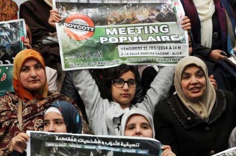 Algerians attend the gathering organised by opposition political parties calling for a boycott of presidential elections on 17 April Rival Islamist and secular party opposition supporters attended Friday's rally.