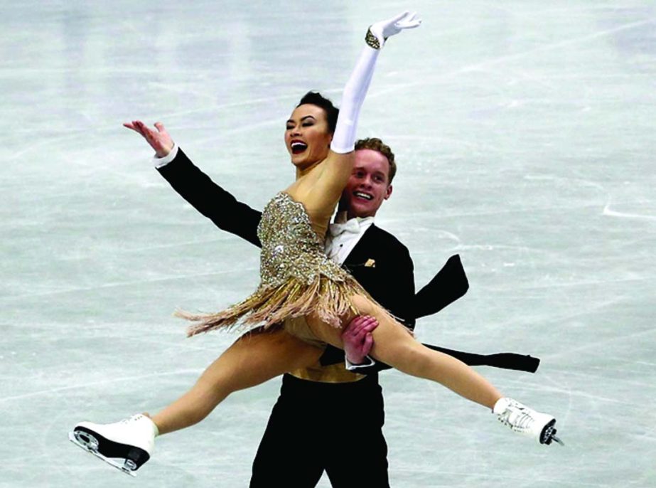 Madison Chock and Evan Bates of the United States perform during Ice Dance Short Dance of the World Figure Skating Championships in Saitama, near Tokyo on Friday.