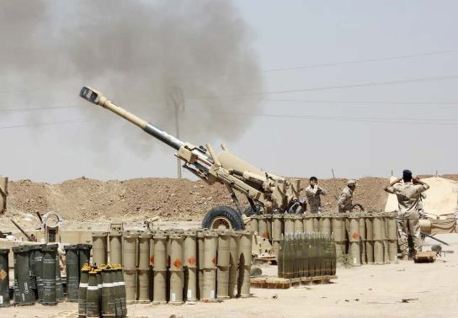 Iraqi security forces fire artillery during clashes with Sunni militant group Islamic State of Iraq and the Levant (ISIL) on the outskirts of the town of Udaim in Diyala province.