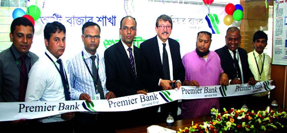 Dewan Anwarul Latif and AKM Shamsuddin, Deputy Managing Directors of Premier Bank Limited, inaugurating two branches of the bank at Atibazar branch, Keraniganj and Kali-bari Bazar branch, Araihajar, Narayanganj recently.