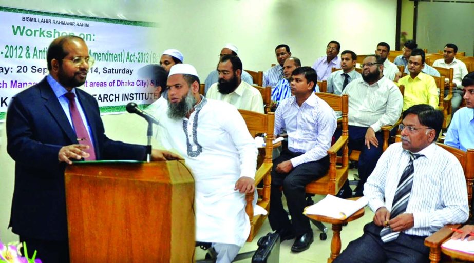 Md Habibur Rahman, Managing Director of Al-Arafah Islami Bank, inaugurating a day-long workshop on "Money Laundering Prevention Act-2012 & Anti-Terrorism (Amendment) Act-2013" at its Training Institute on Saturday. Principal of the institute Md Zahid Ha